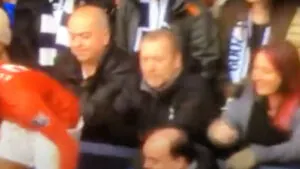Female Tottenham fan pinches Patrice Evra on the bum