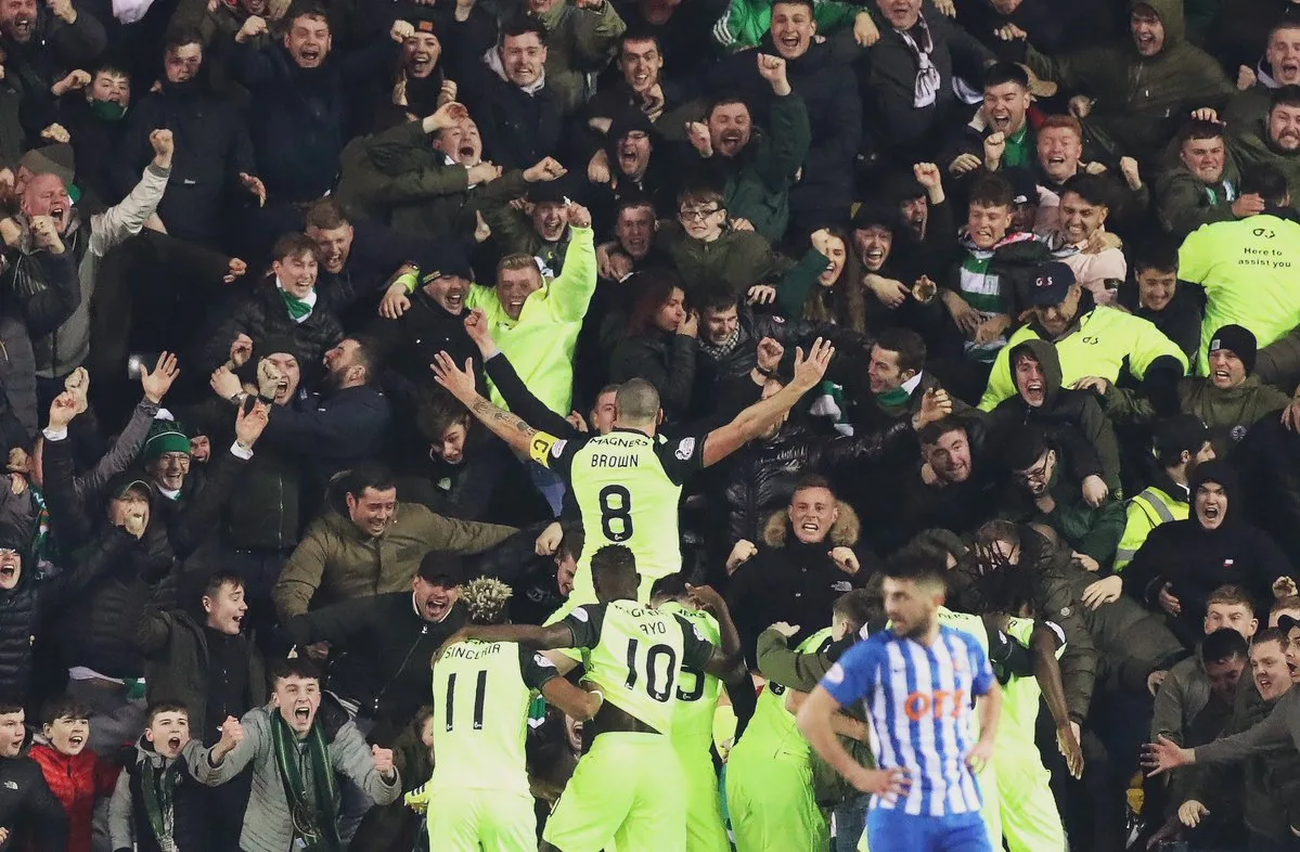 Iconic moment as Scott Brown celebrates with Celtic fans