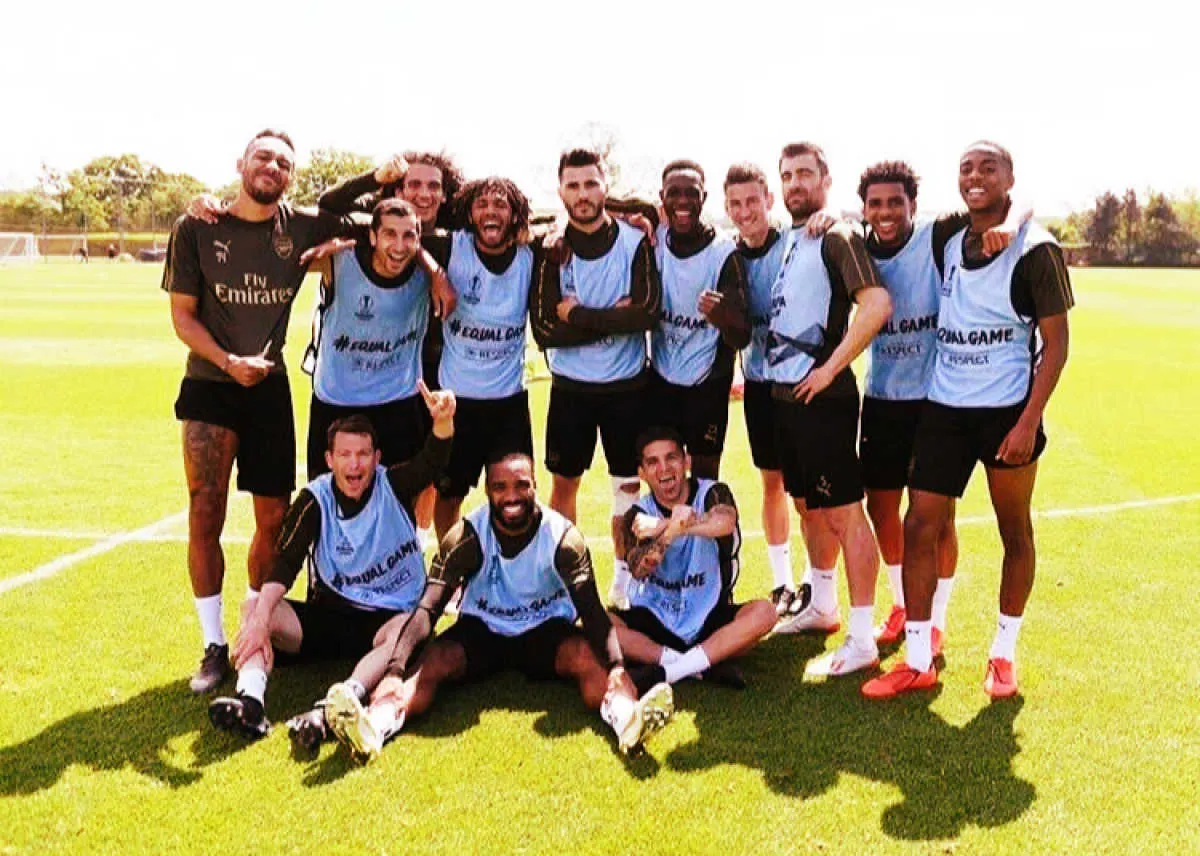 Arsenal players posing for a photo after a training game before Europa League final