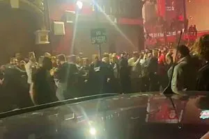 An ugly fight broke out between Liverpool fans outside Anfield as club lifted its first Premier League trophy