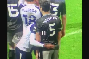 Darnell Fisher grabbing a feel of Calum Paterson’s crotch