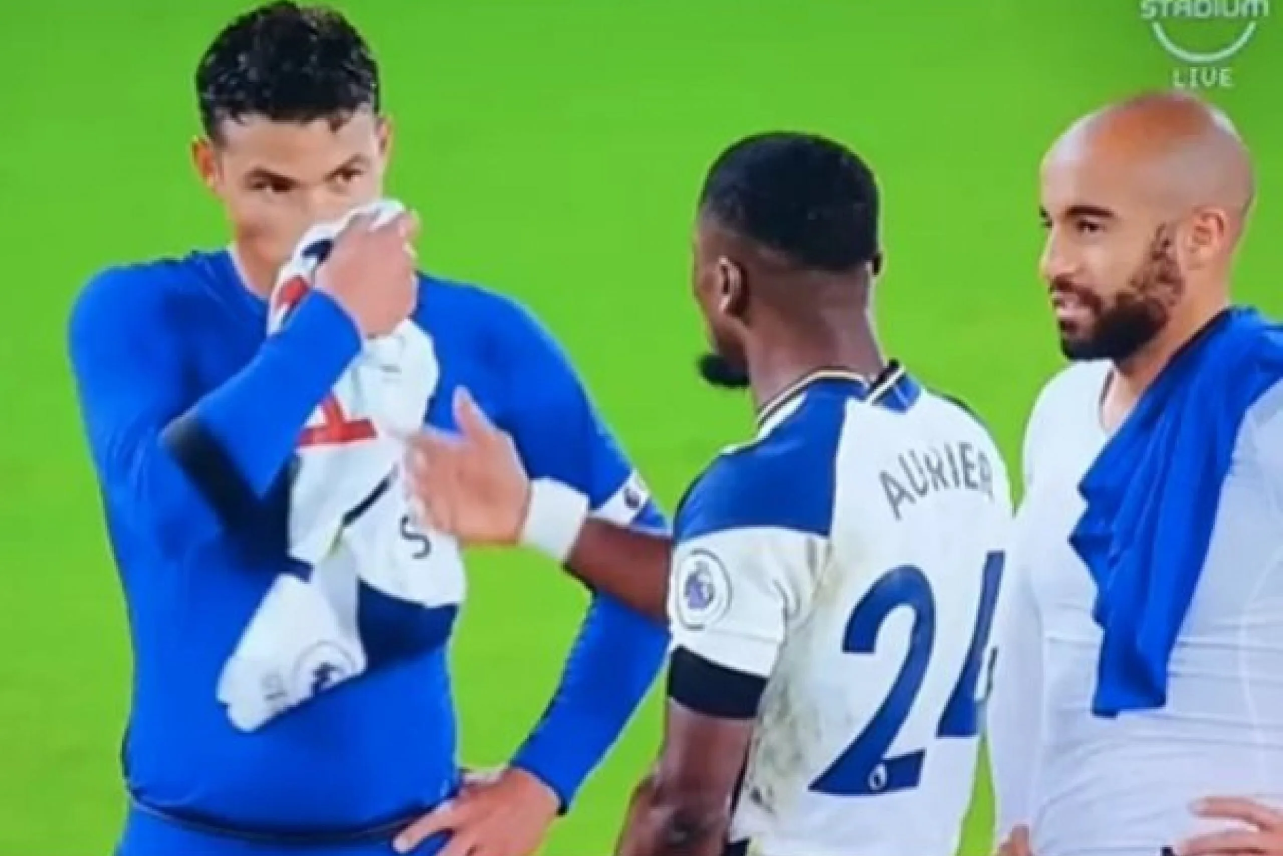 Thiago Silva wiping his nose with Lucas Moura's Tottenham jersey
