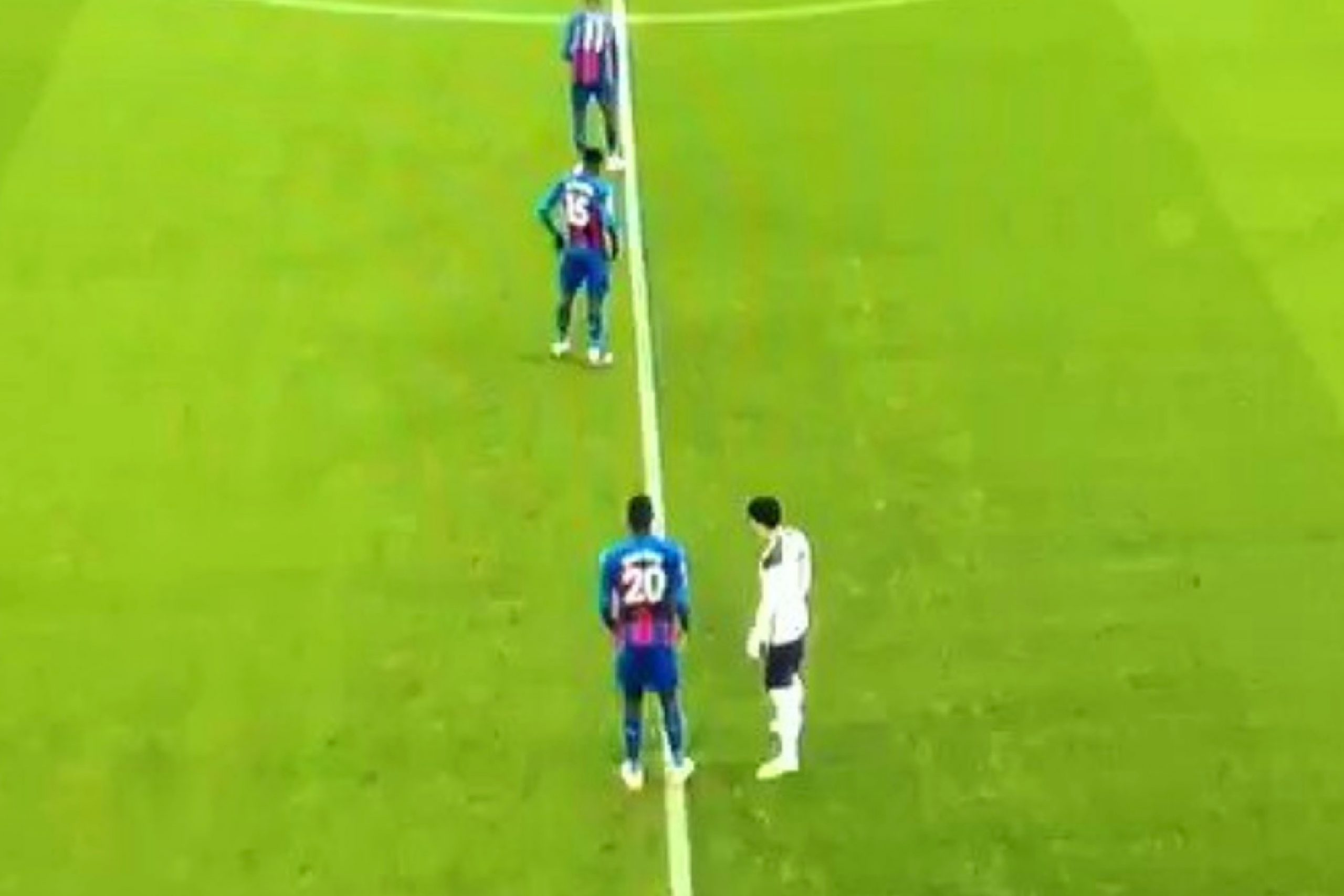 Son Heung-min And Christian Benteke wrestle each other whilst everyone else takes the knee