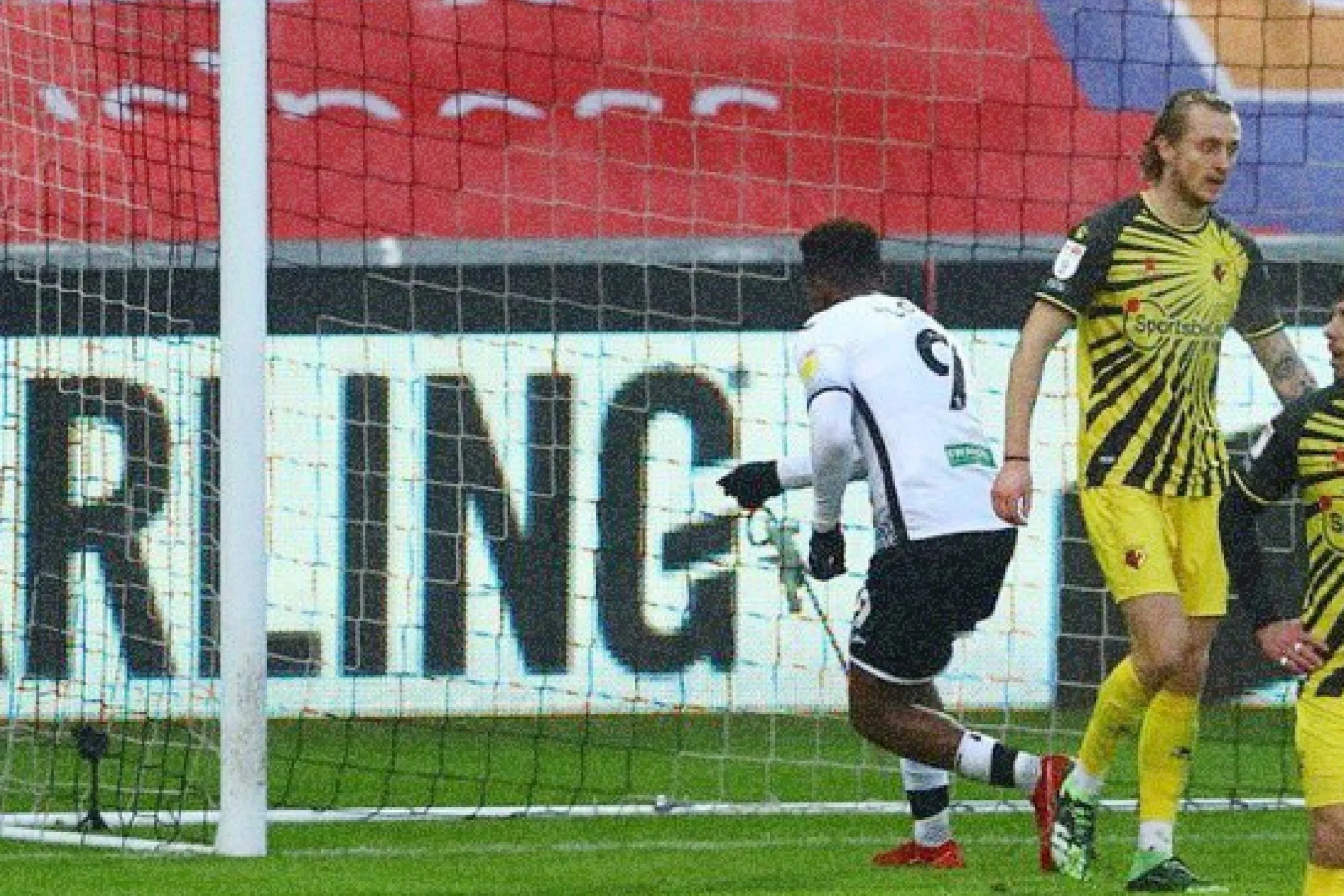 Jamal Lowe celebrates scoring a goal against Watford by pointing at Ben Foster's GoPro