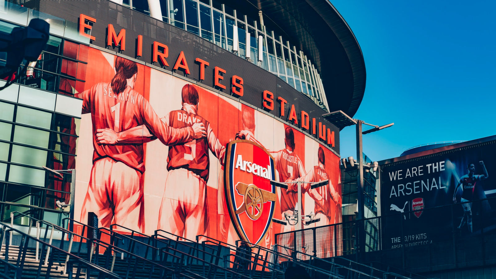 Photo: The Arsenal crest at the Emirates appears to be in tatters
