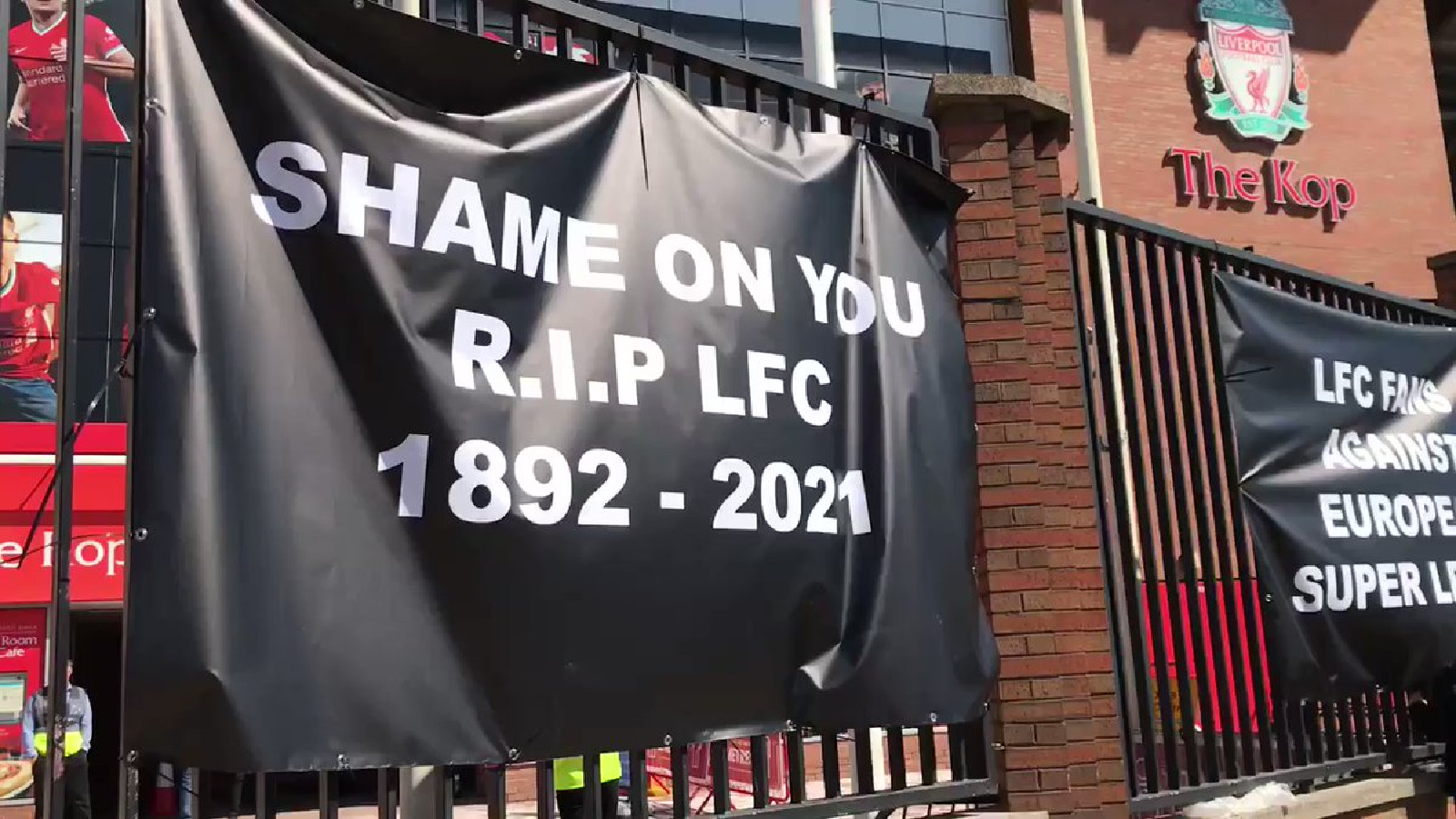 Liverpool fans protest against the Super League as 'RIP LFC' banner is hung outside Anfield