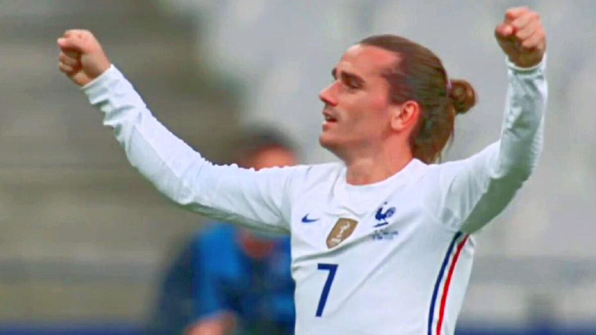 Antoine Griezmann celebrates after scoring a bicycle kick goal against Bulgaria