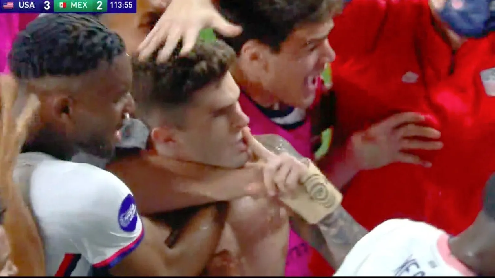 Christian Pulisic shushing Mexico fans after game winning penalty in extra time in the CONCACAF Nations League final.