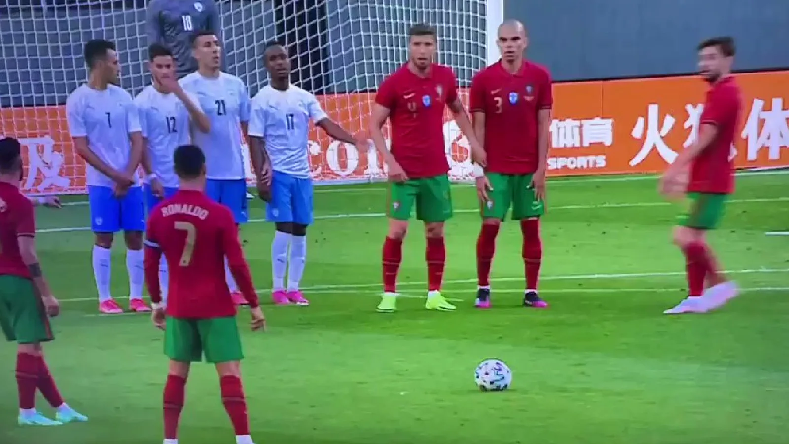 Cristiano Ronaldo taking his famous stance before skying his free-kick against Israel