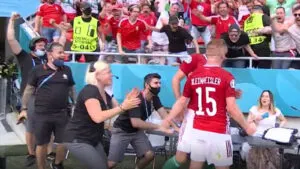 Hungary players startle female pitchside announcer with their goal celebrations against France