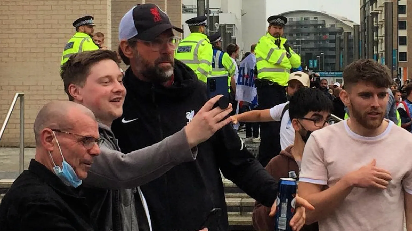 Jurgen Klopp lookalike spotted taking pictures with England fans outside Wembley