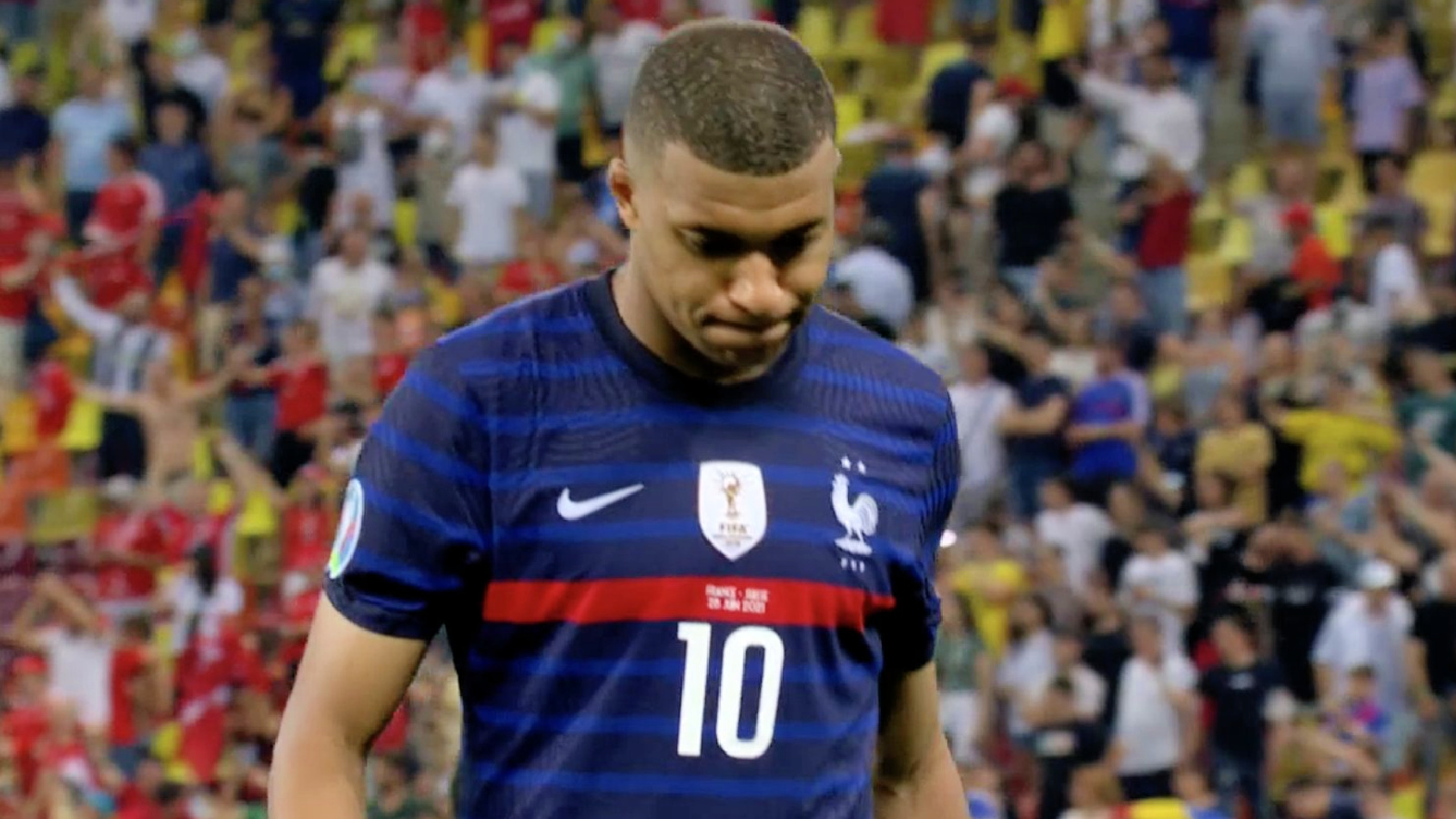 Kylian Mbappe hangs his head in shame after missing France's fifth penalty against Switzerland