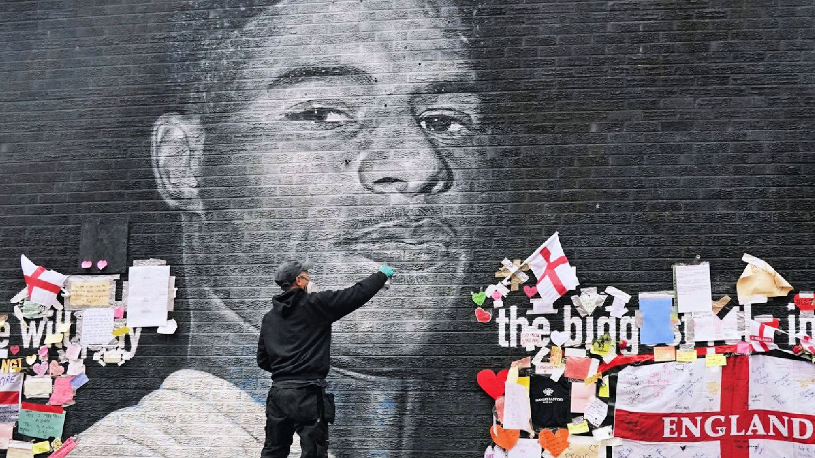 Watch: Original artist resprays defaced Marcus Rashford mural in Manchester