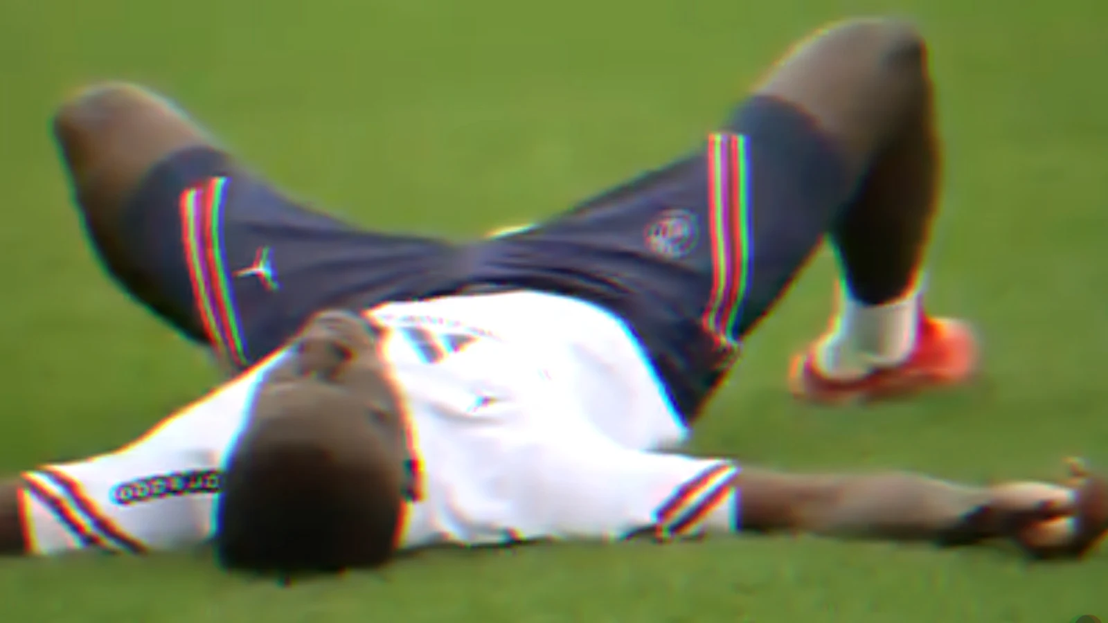 Idrissa Gana Gueye lying flat on the ground as Mauricio Pochettino's training sessions takes its toll
