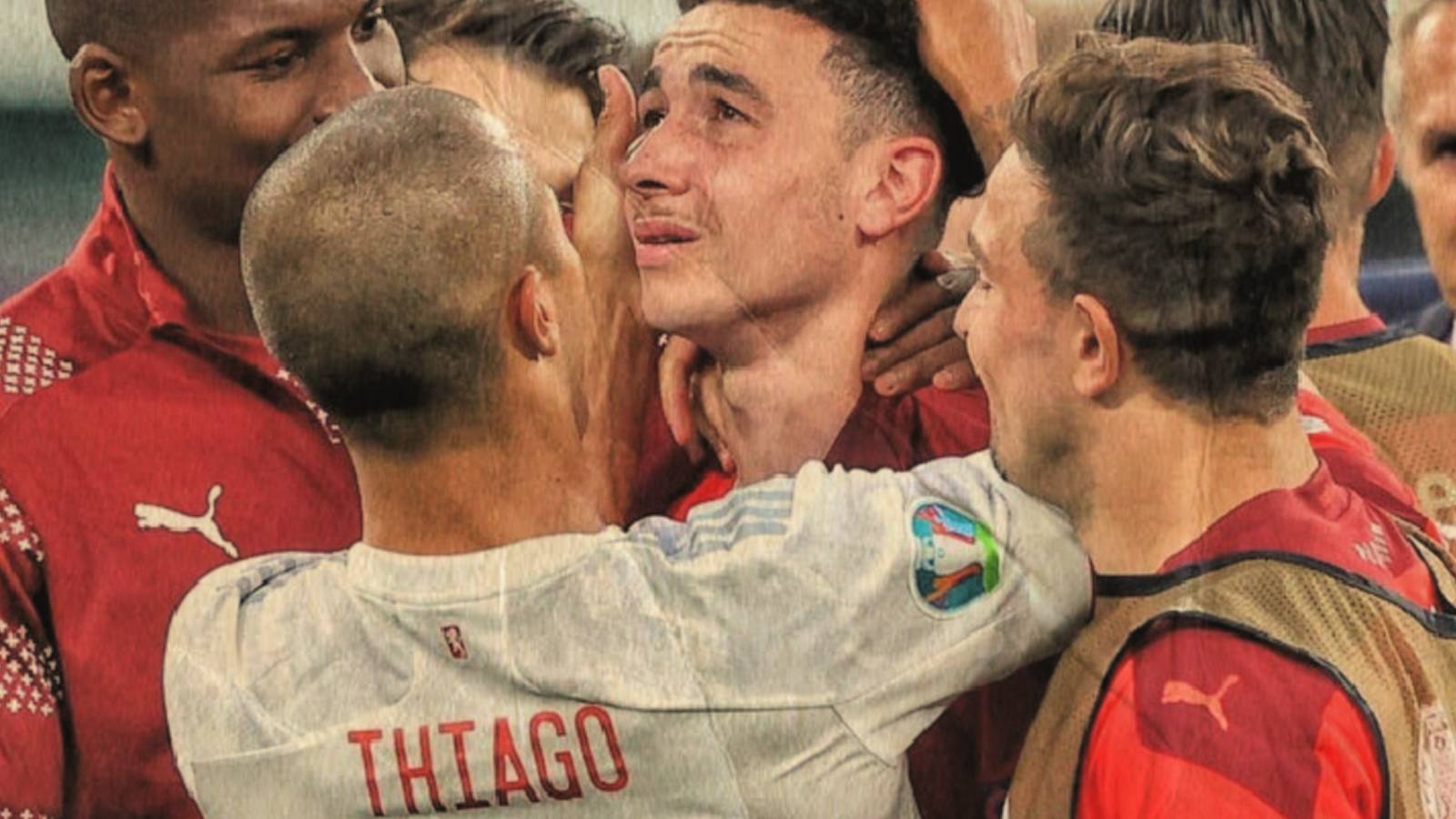Thiago Alcantara consoling Ruben Vargas after the penalty shootout between Spain and Switzerland