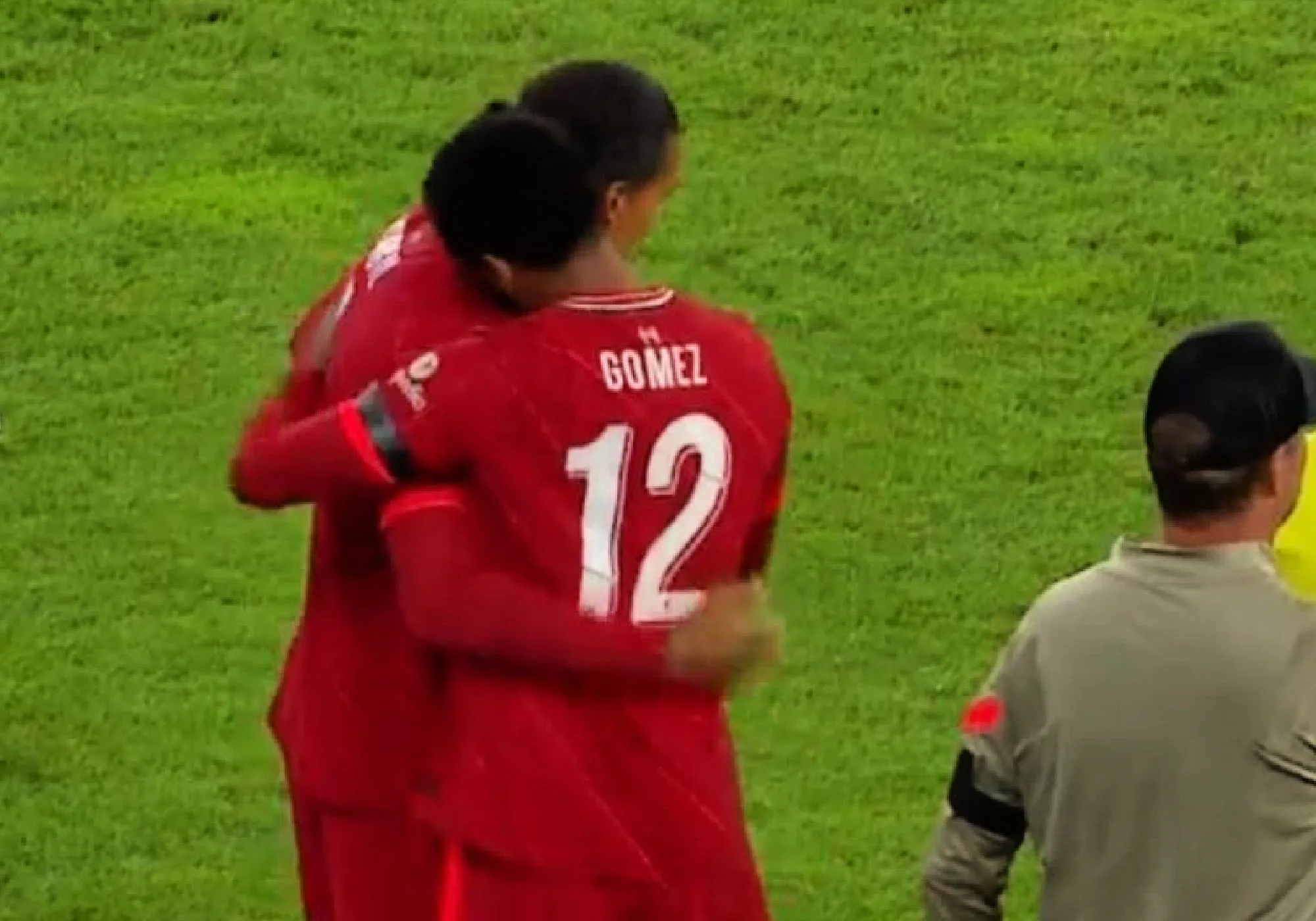 Virgil van Dijk and Joe Gomez share a hug on the touchline as the Liverpool centre-back duo make their much-awaited return to action against Hertha Berlin