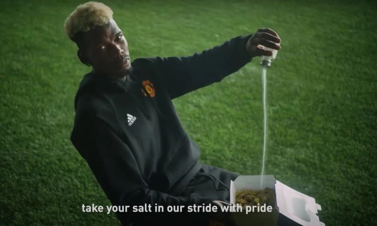 The screenshot of Paul Pogba pouring salt in Man United's kit launch video