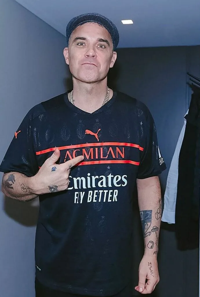 Robbie Williams rocking AC Milan's third kit for 21/22 season from Puma