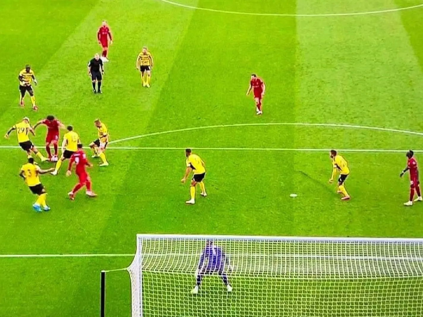 Mohamed Salah surrounded by Watford players before his goal
