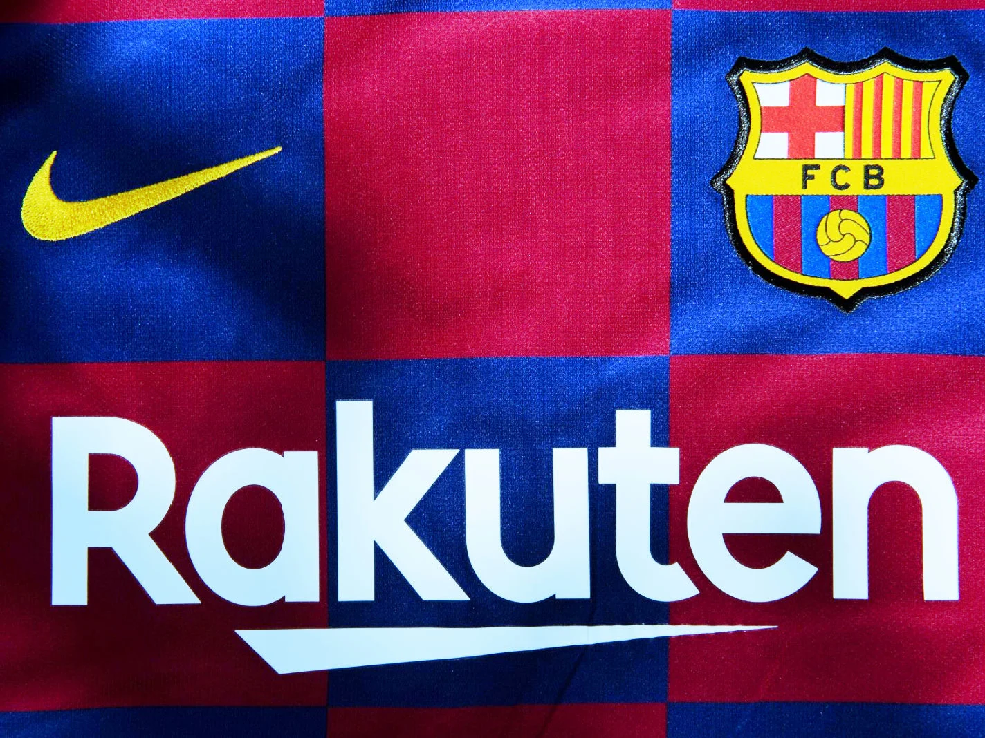 Nike, Barcelona and Rakuten logo