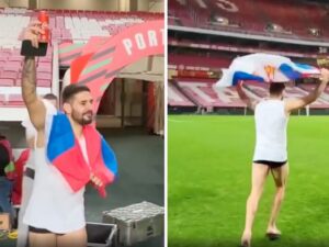 Aleksandar Mitrovic celebrates with a Coke can