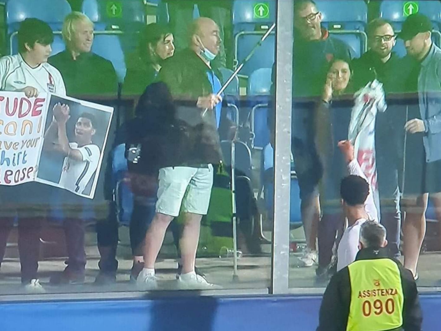 Ouch: Sign-bearing boy blanked by Jude Bellingham for another England fan stood inches away
