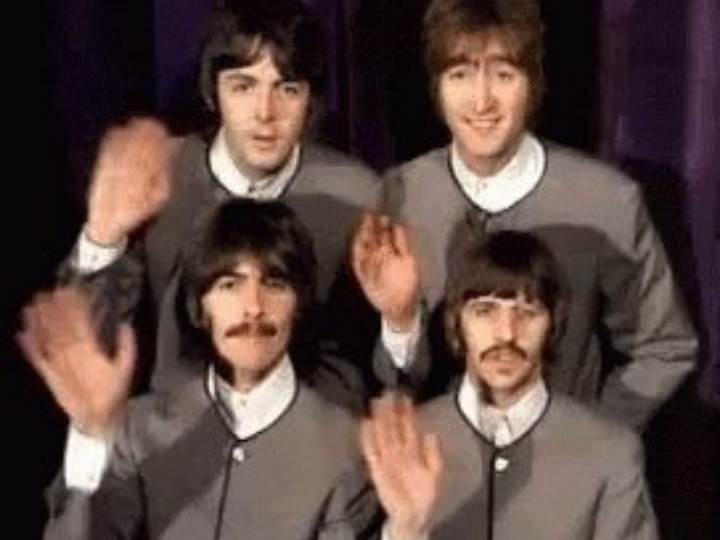 The Beatles waving goodbye
