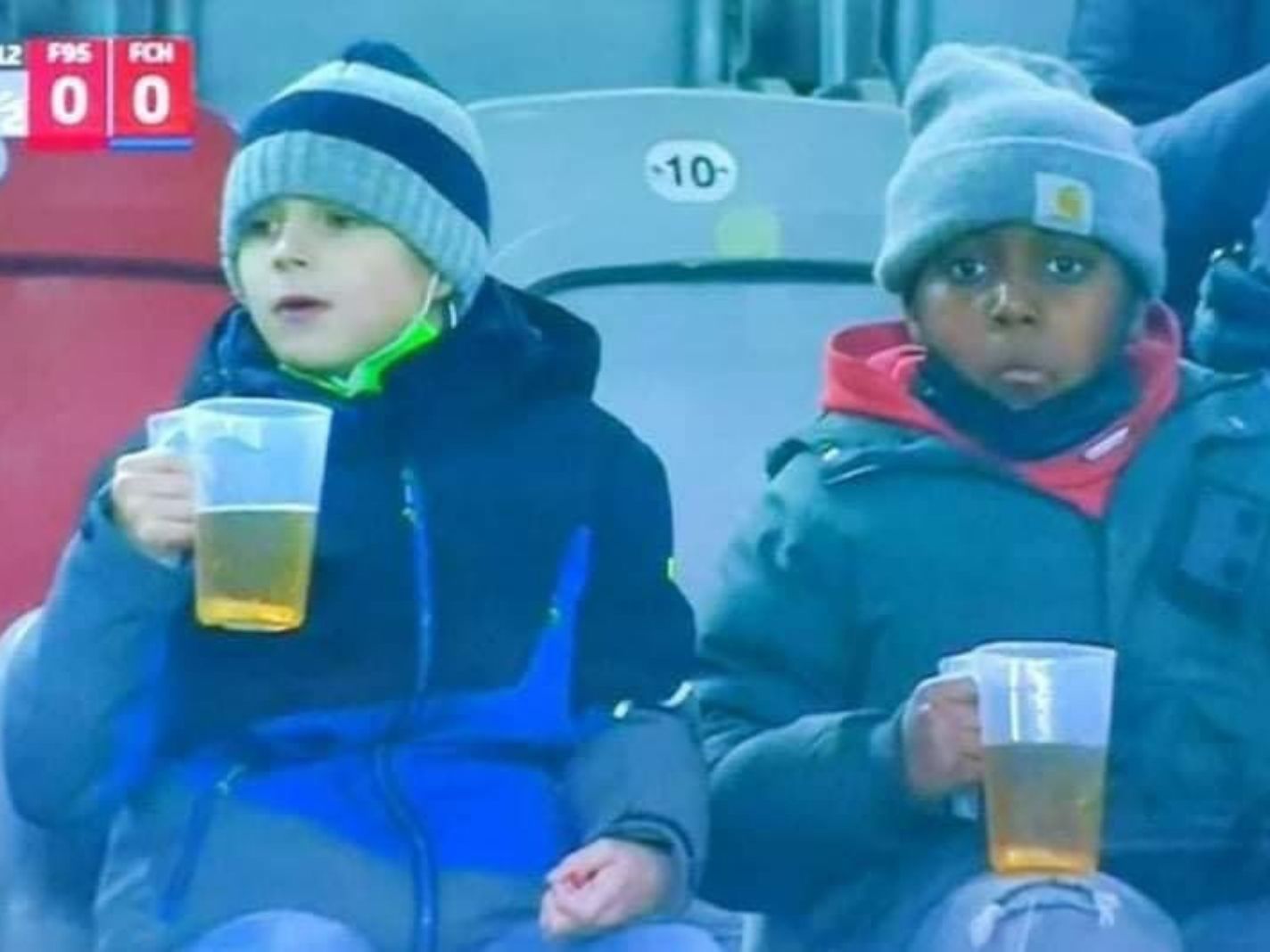 Young football fans spotted drinking beer in Germany - Here's the truth behind viral photo