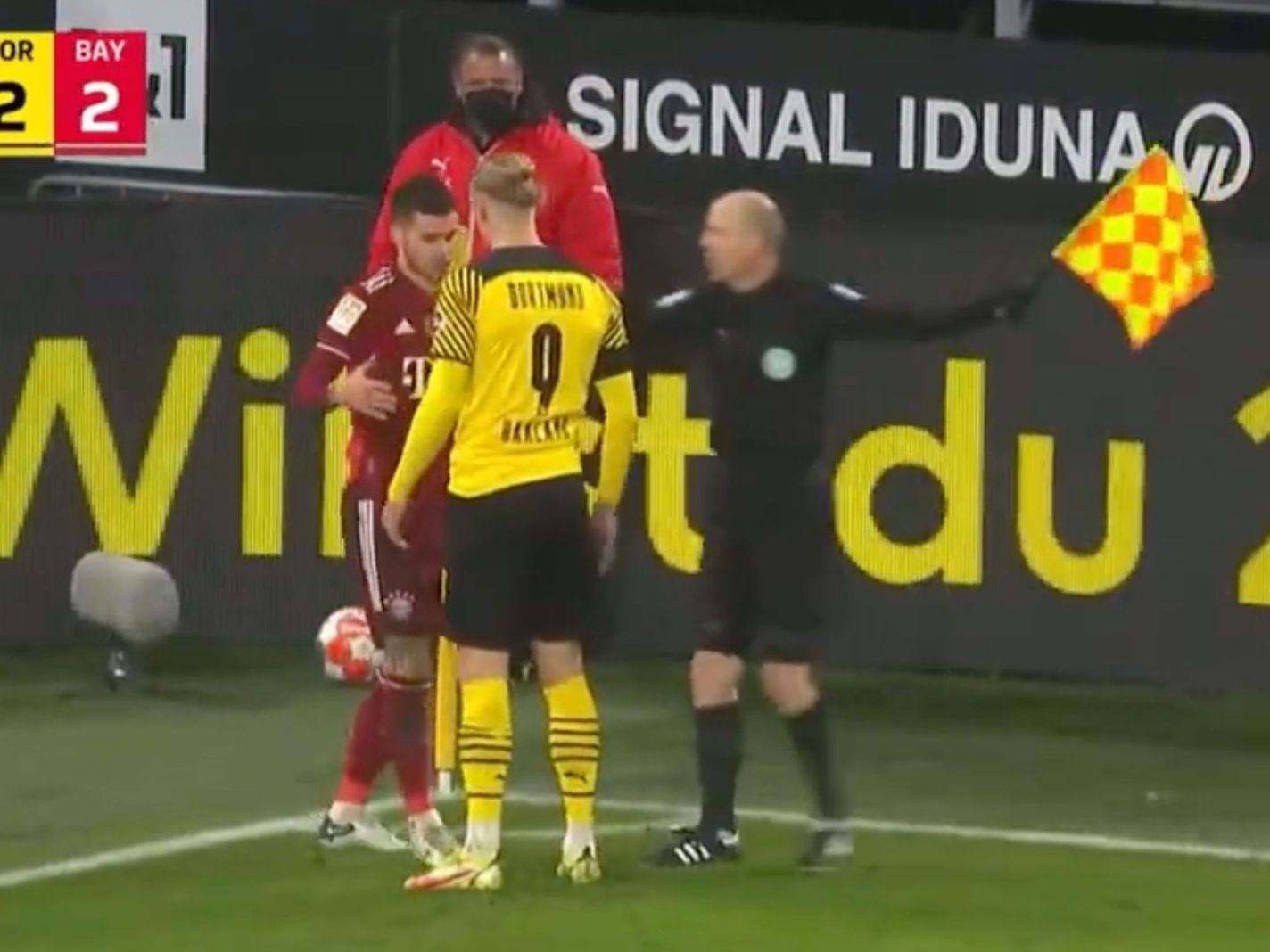 Bayern Munich's Lucas Hernandez was ready to square up after a challenge but made amends when he realized that it was the enormous Borussia Dortmund forward Erling Haaland who had upended him.