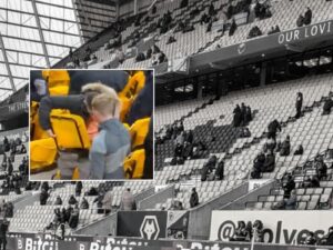 Liverpool fans spotted robbing seats in Molineux
