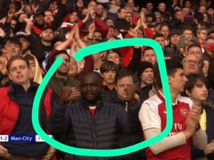 An Arsenal fan was spotted fist-pumping after Man City defeat at Emirates