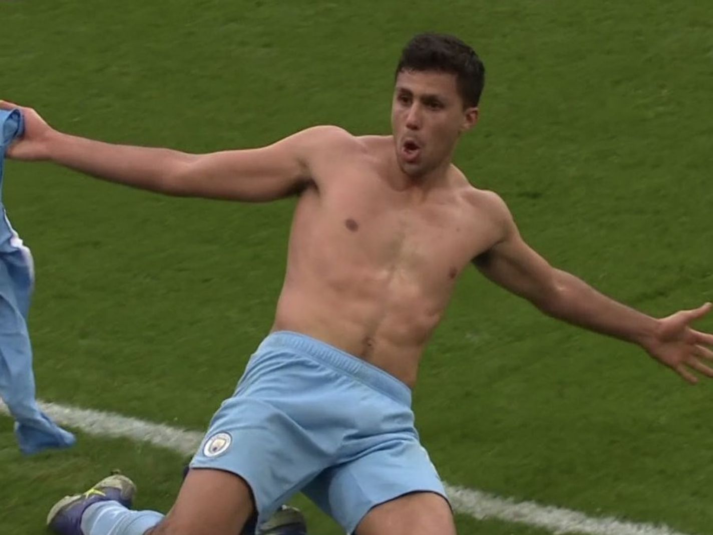 Rodri takes off his shirt during wild celebration in front of Arsenal fans