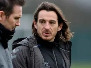 Leighton Baines shows off free-flowing long hair in training
