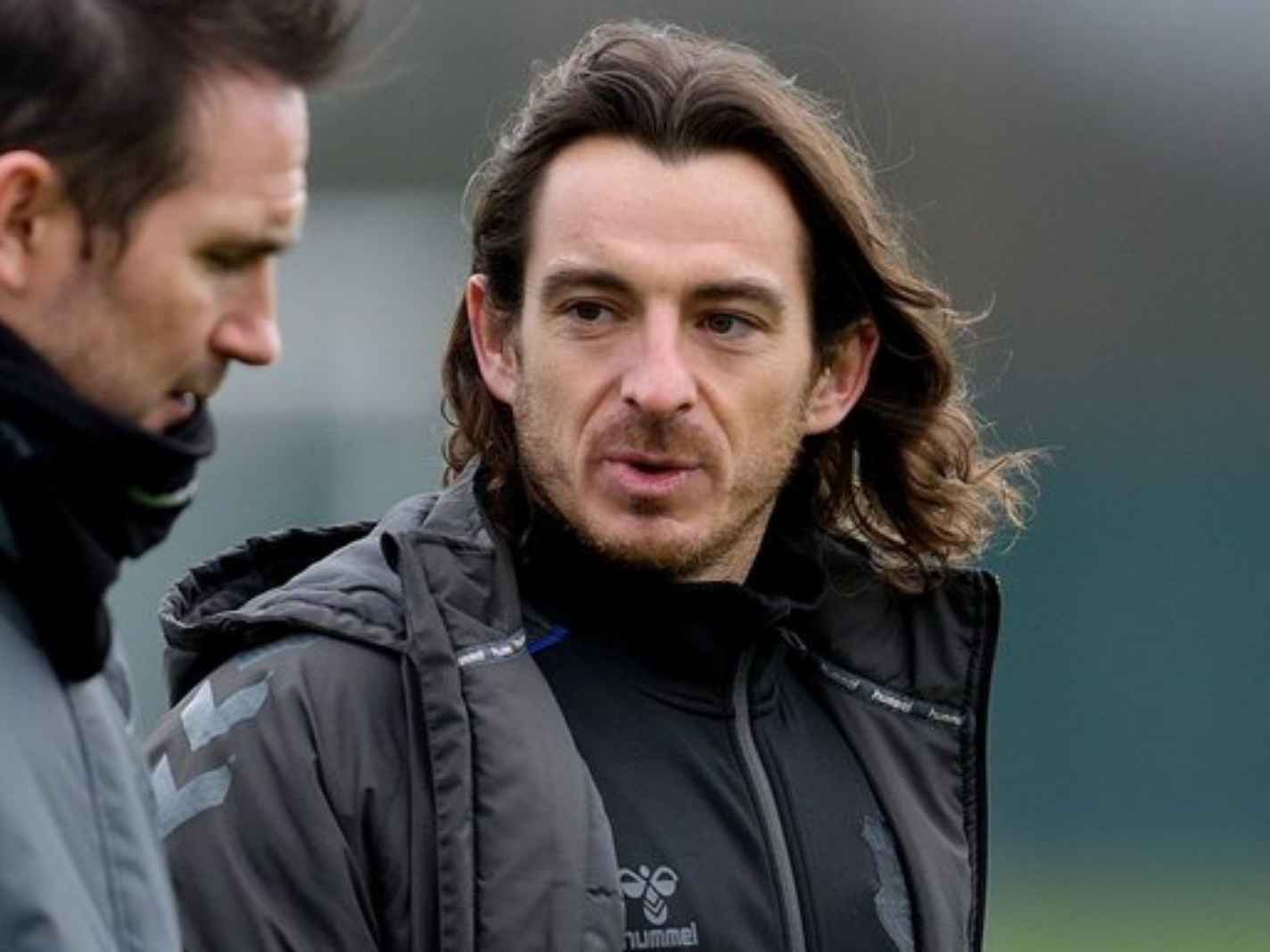 Leighton Baines shows off free-flowing long hair in training