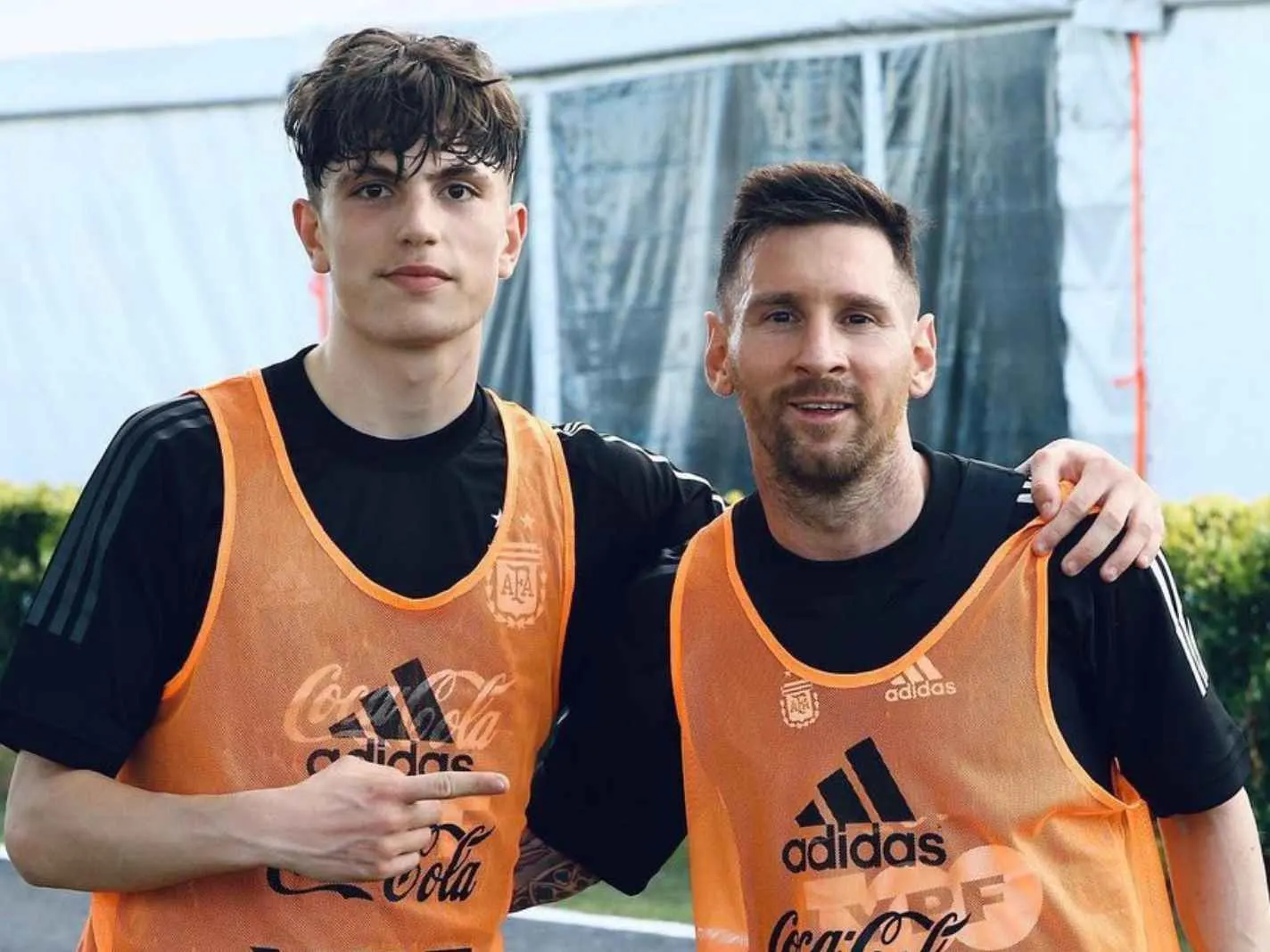 Alejandro Garnacho of Manchester United with Lionel Messi