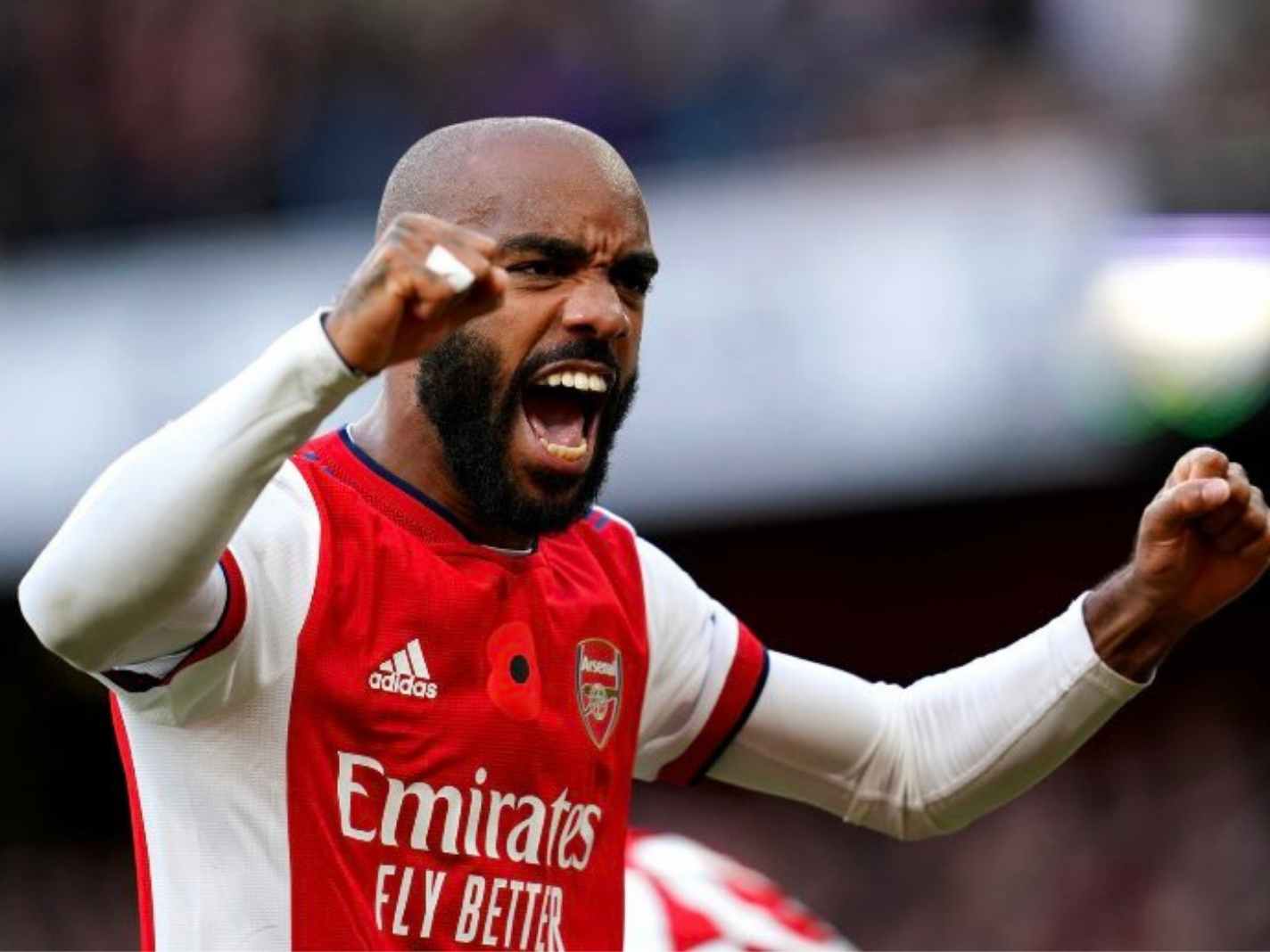 Lacazette has bald head rubbed by Ben White in oddest goal celebration ever
