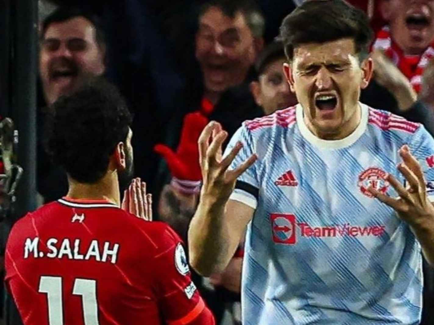Mohamed Salah celebrates with tree pose as Harry Maguire rages in background 