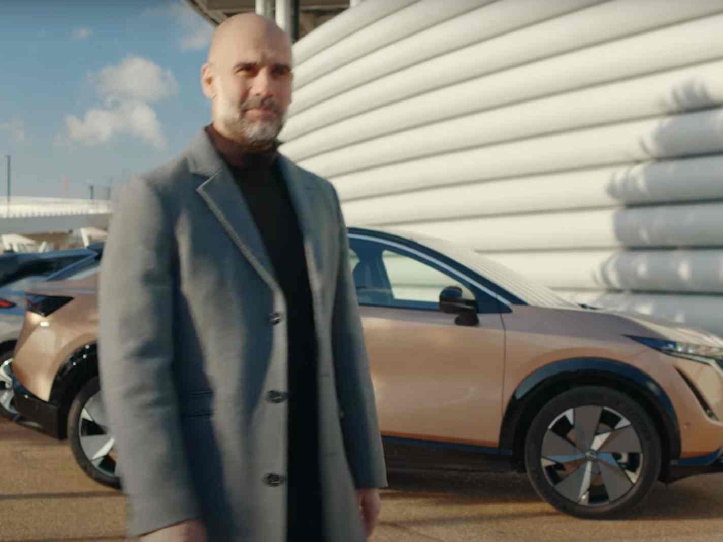 Man City manager Pep Guardiola takes the wheel in a new ad for Nissan