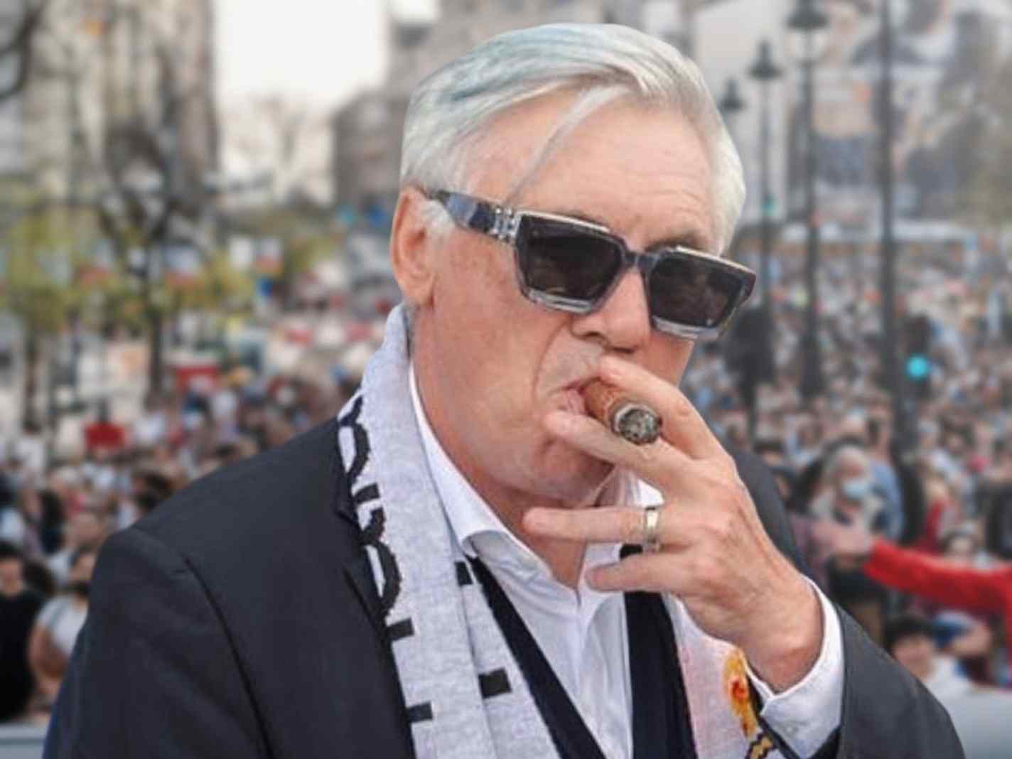 Carlo Ancelotti smoking a cigar during Real Madrid's title celebrations
