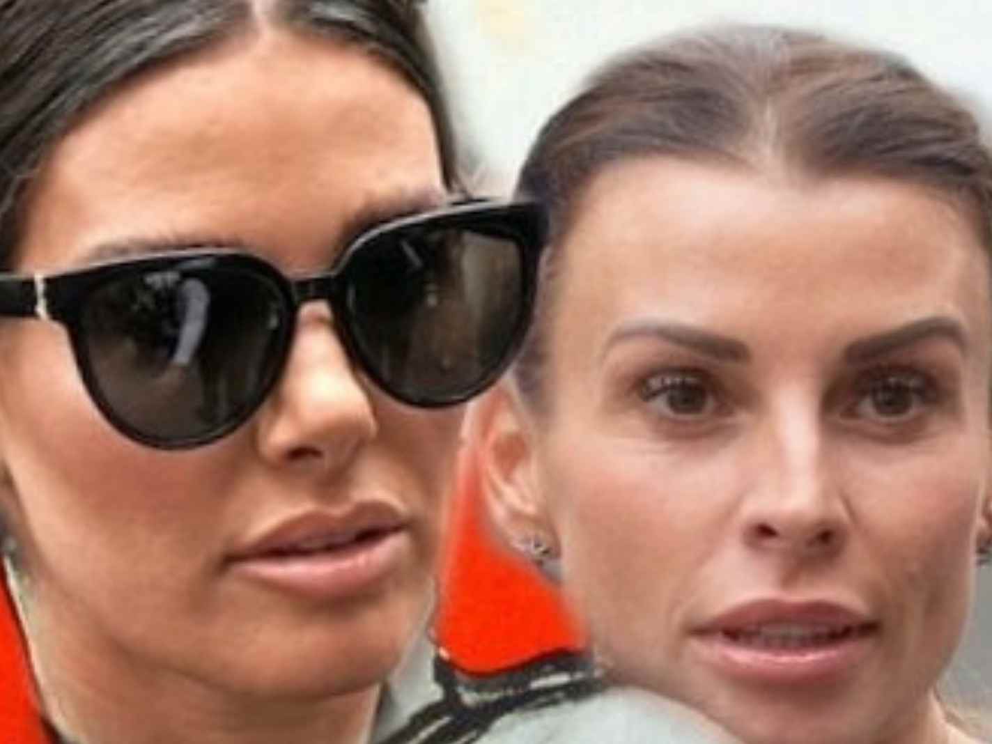 In this image - Faces of Rebekah Vardy and Coleen Rooney