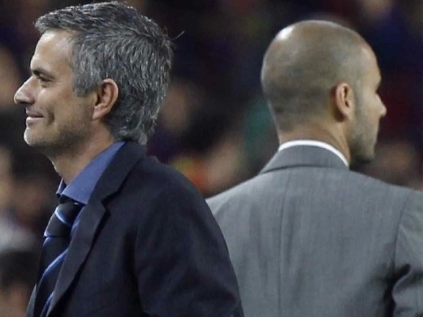In this image - Jose Mourinho and Pep Guardiola