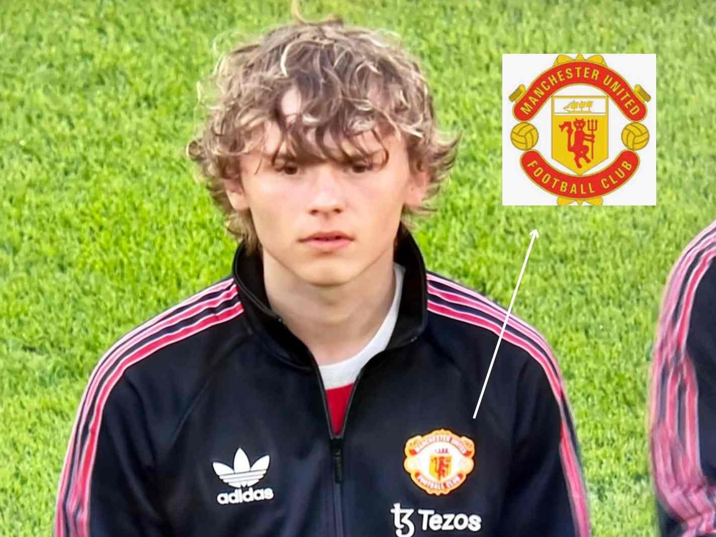 In this image - Man United youth player wearing jacket with old crest with letters 'Football Club'.
