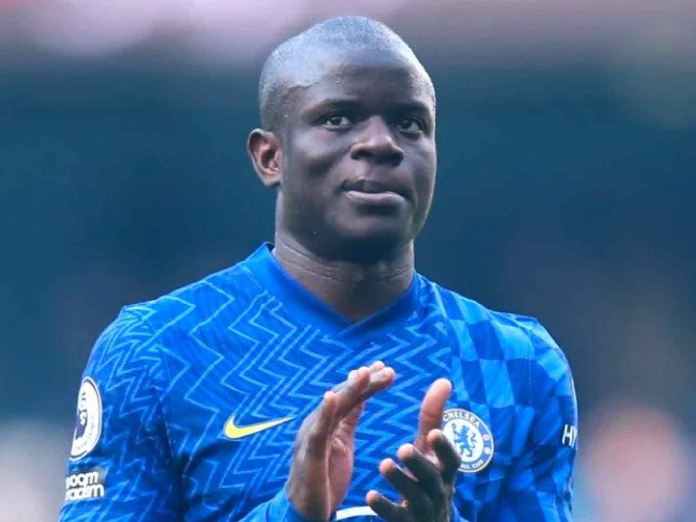 In this image - N'Golo Kante clapping during a Chelsea game