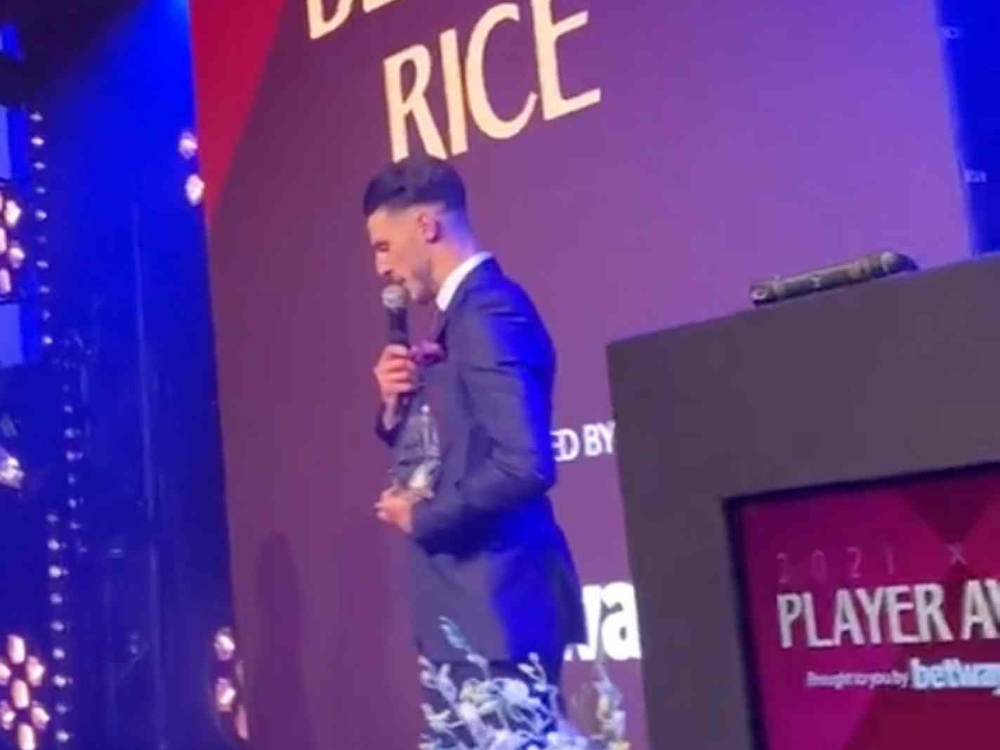 The image shows Declan Rice addressing the audience during Hammer of the Year awards.