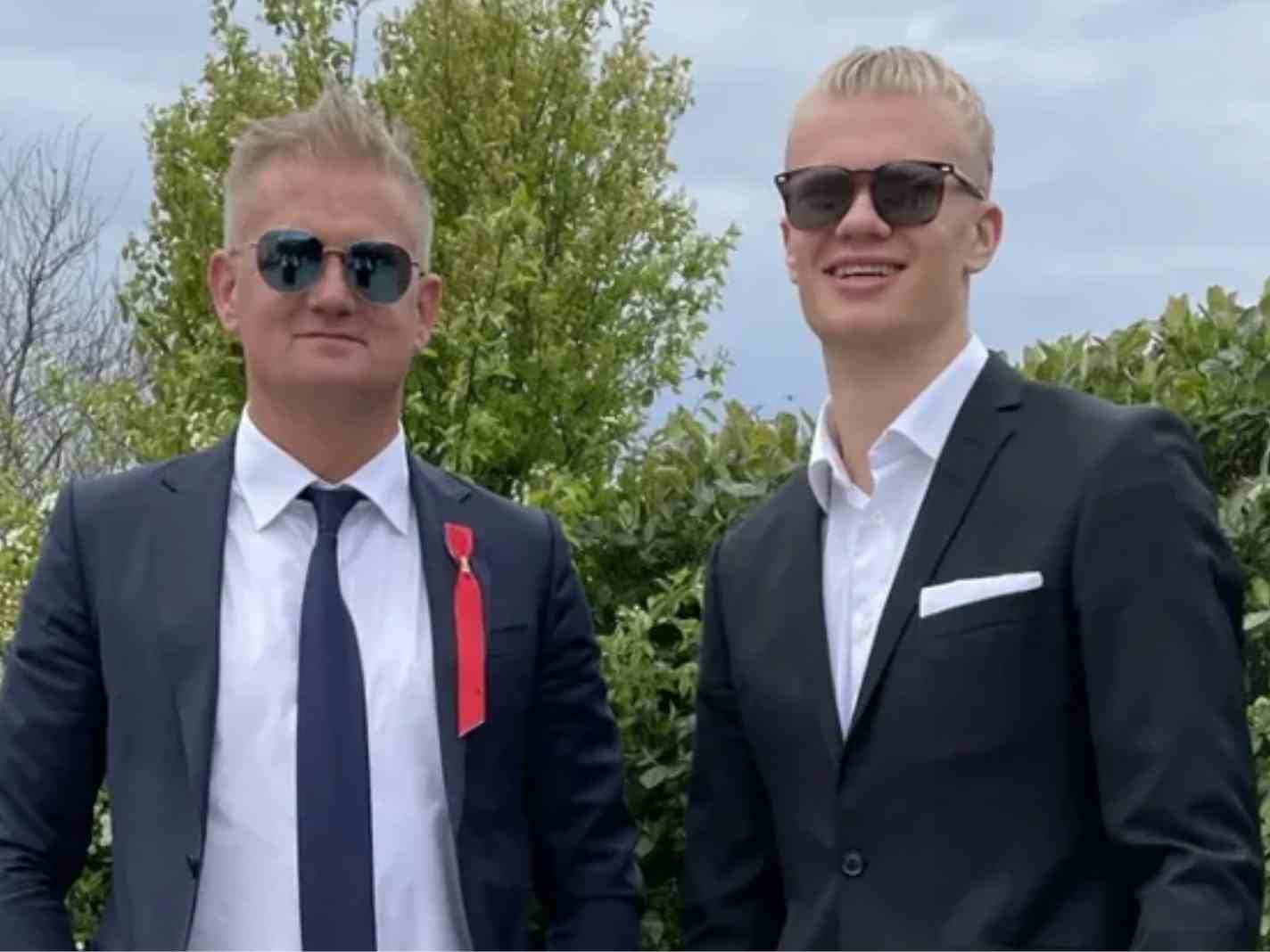 The photo shows Erling Haaland (left) and his father Alfie suited for the Norwegian Constitution Day.