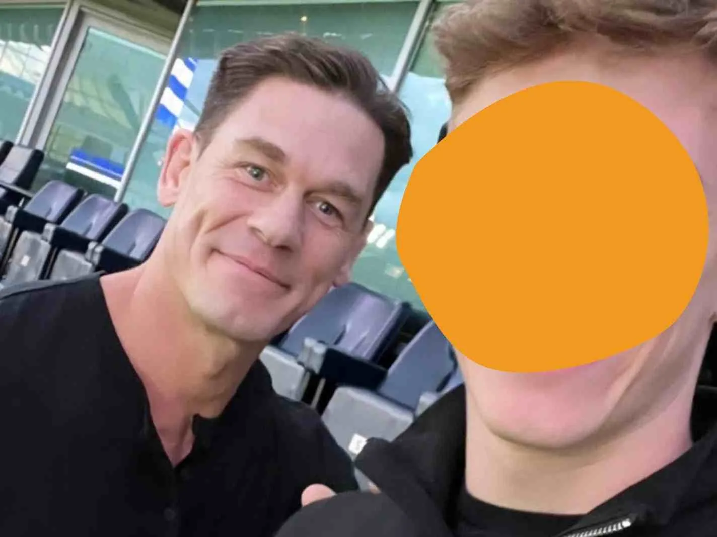 The photo shows John Cena at Stamford Bridge along with a fan.