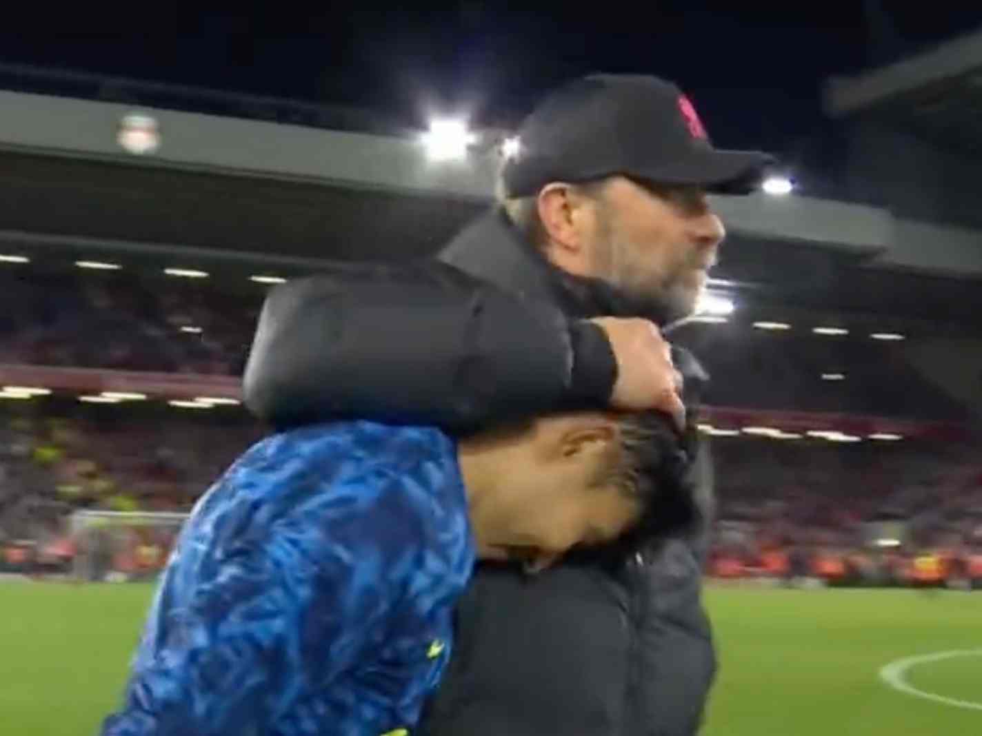 The photo shows Jurgen Klopp hugging Son Heung-min at full-time after the 1-1 draw between Liverpool and Tottenham Hotspur at Anfield.