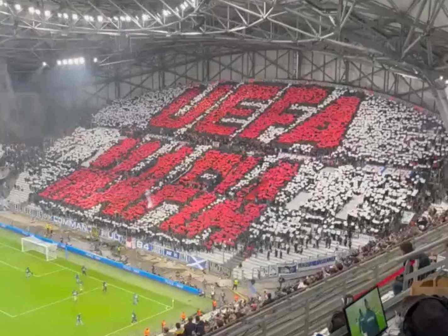 The photo shows Marseille fans displaying a UEFA MAFIA tifo during their Conference League clash against Feyenoord
