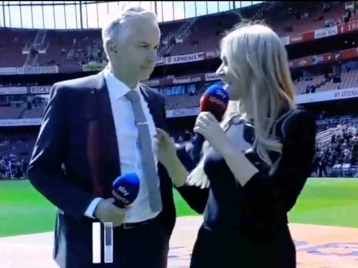The photo shows Sky Sports presenters Alan Smith and Laura Woods.