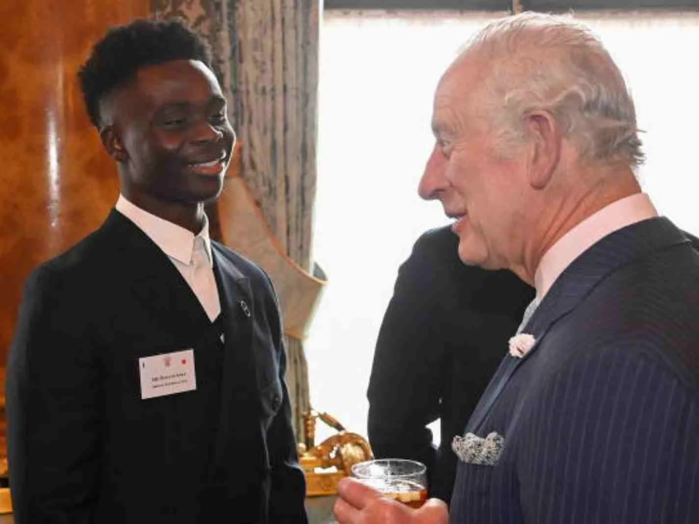Bukayo Saka meets Prince Charles.